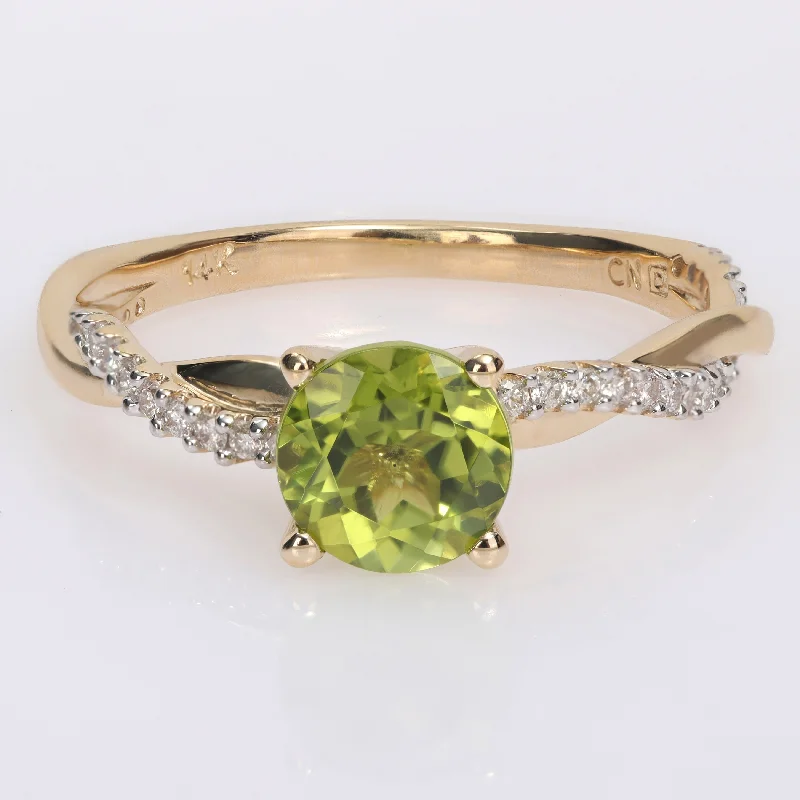 Miadora Peridot and 1/6ct TDW Diamond Crossover Birthstone Ring in 14k Yellow Gold